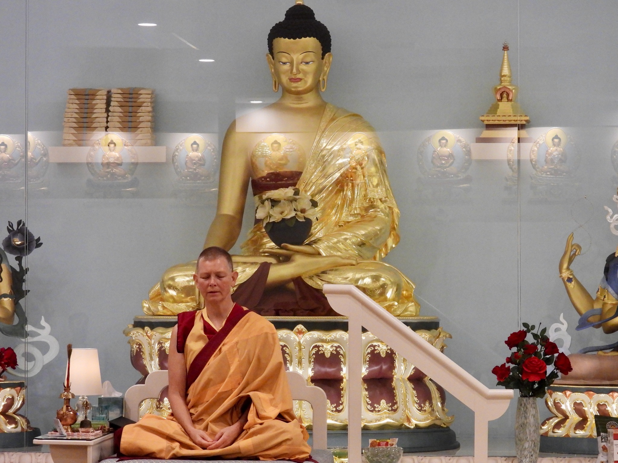 Gen Lhadron meditating with Buddha